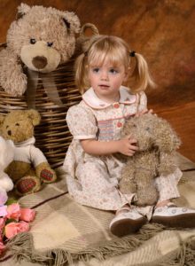 Little girl with teddy bears - People Portraits Photo by Neil Forman Photography